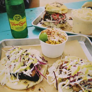 Taco Combo, Elote Street Corn, Brisket Sandwich, Jalapeno Popper Potato Salad