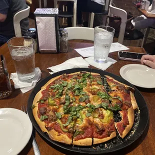 Small green pepper, Italian sausage, basil pizza