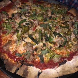 Jalapeño, pepper, and sausage pizza