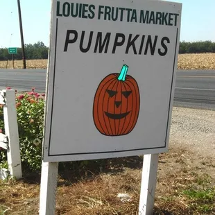 a sign for pumpkins