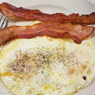 Eggs over medium and bacon