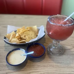 Raspberry Margarita, queso dip and salsa.