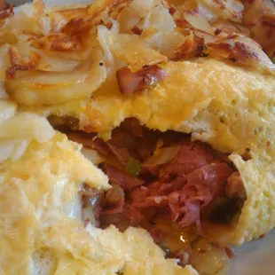 Louie&apos;s Mistake omelette with hash browns