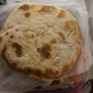 Pita bread on top is Greek Chicken Salad