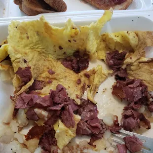 Pastrami omelet with Swiss cheese hash Browns wheat toast hardly no cheese and the  omelet started tasting nasty.