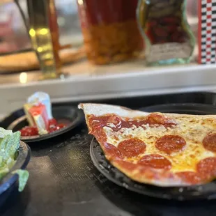 Pepperoni pizza, Caesar salad, strawberry cheesecake