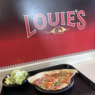 Veggie pizza and Caesar salad