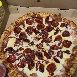 a pepperoni pizza in a box