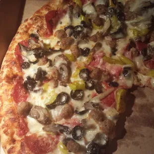 Louies deluxe pizza. Packed with toppings!  yum