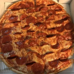 a pepperoni pizza in a box
