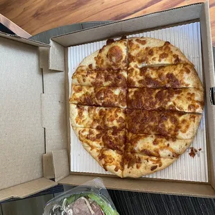 a pizza in a pizza box
