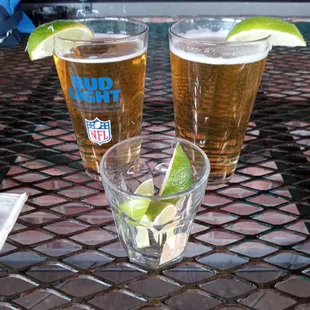 Two Dos Equis and some extra limes.