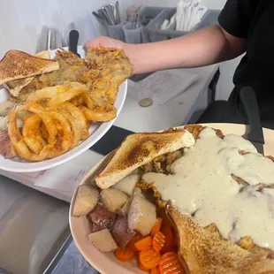 two plates of food on a counter