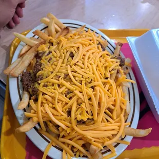You call this chili cheese fries... fucking cheese isn&apos;t even melted !!!!