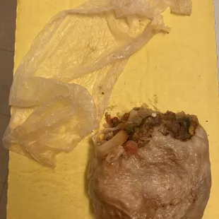a piece of bread and plastic wrap