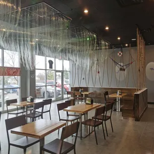  tables and chairs in a restaurant