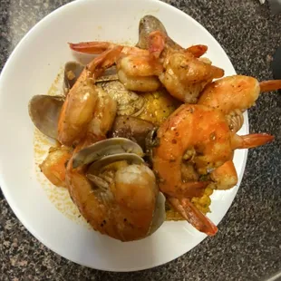 a plate of shrimp and clams