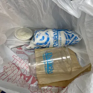 Empty drink cup and sloppy gyro