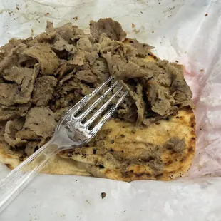 Soggy, greasy gyro meat on a grease soaked pita