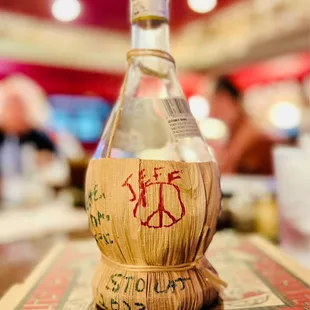 a bottle of wine on a table