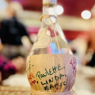 a bottle of wine on a table