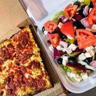 a pizza and a salad
