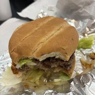 Single with grilled onion, lettuce, pickle, tomato.