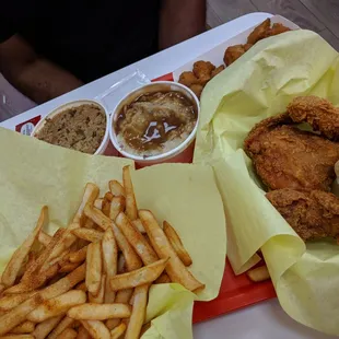 Top L-Bottom R: Dirty rice, mashed potatoes, fried okra, fries &amp; fried chicken