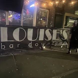 a woman walking down the street