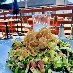 Louise's Chop salad and outdoor seating