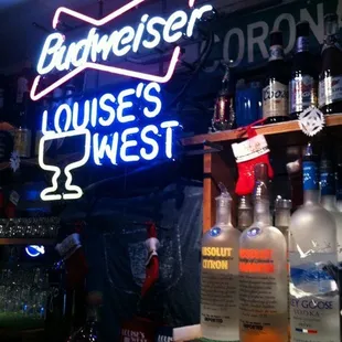 a neon sign in a liquor shop