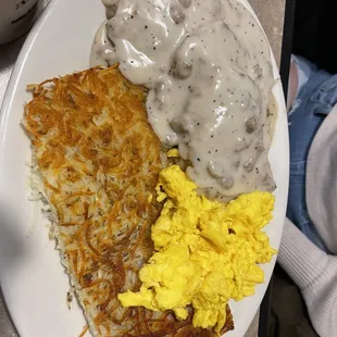 Biscuits and sausage gravy w/ scrambled eggs and crispy hash browns