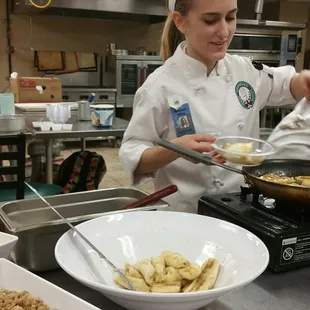 She was whipping up a Bananas Foster! Let Louisiana Culinary Institute cater your next event!