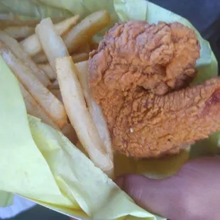 Fried chicken wing and fries