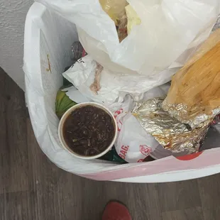 In the trash where it belongs