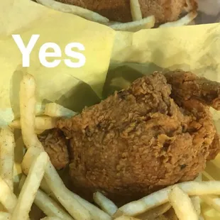 a fried chicken sandwich and french fries