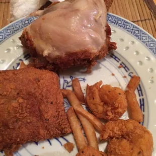 My skin and fully cooked chicken. With fries and shrimp
