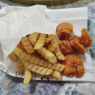 Side of shrimp, which were good. Fries had no flavor despite the visible seasoning, and weren't crispy.