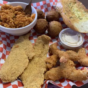 3 shrimp and 2 catfish hush puppies n Jambalaya rice.