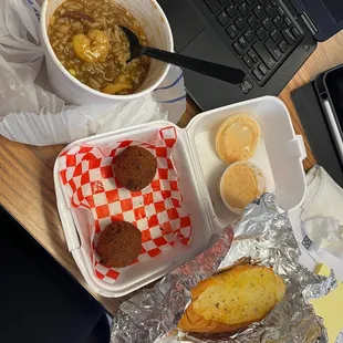 Shrimp and sausage gumbo 8/10 (3rd time ordering this for lunch), hush puppies 9/10, and garlic bread 5/10