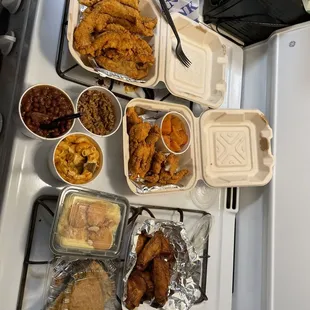 Catfish , red snapper, yams, dirty rice, red beans and rice , Mac &amp; Cheese, cajun rub wings , banana pudding, and sweet potato pie!