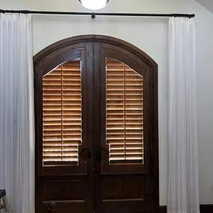 double doors leading to bedroom