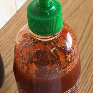 No tops on the bottles, germs/bacteria fall straight in. Gunk on walls and floors. They sneezed on the food, too much.