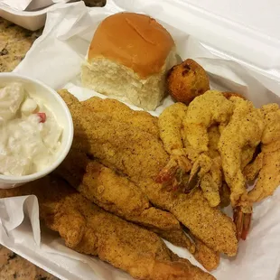 Catfish dinner with 3 added jumbo shrimp. Potato salad and hushpuppies