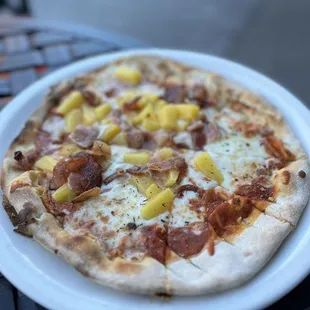 a plate of pizza on a table