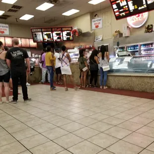 customers waiting in line at the counter