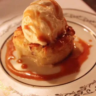 pear and cranberry bread pudding with vanilla ice cream