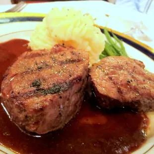 Twin petit filets with herb potato puree and red wine demiglace