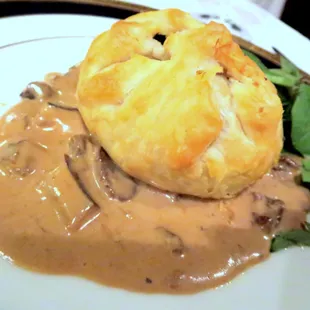 Escargot and shitake mushroom in puff pastry with porcini demiglace