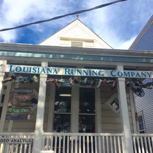 Their wall of fame.  There a lot of miles represented in these shoes.